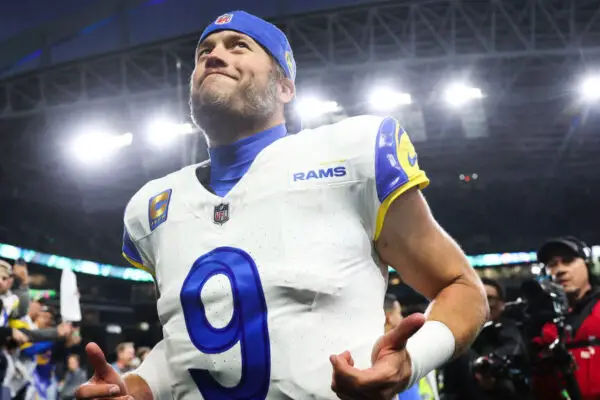 Los Angeles Rams QB Matthew Stafford runs off the field. The Rams currently lead the NFC West...